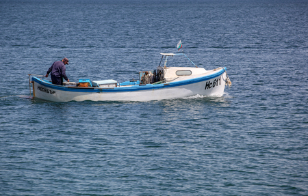 Pomorie, Bulgaria - May 01, 2019: Fishing Boat At Sea.のeditorial素材