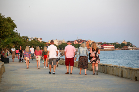 Pomorie, Bulgaria - July 12, 2019: People Visit the Beautiful Seaside Alley In Pomorie Town, Bulgaria.のeditorial素材