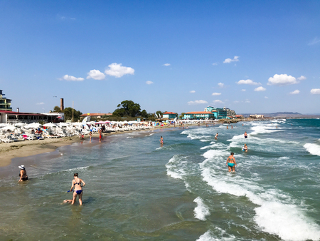 Pomorie, Bulgaria - September 01, 2019: People Relaxing On The Beach.のeditorial素材