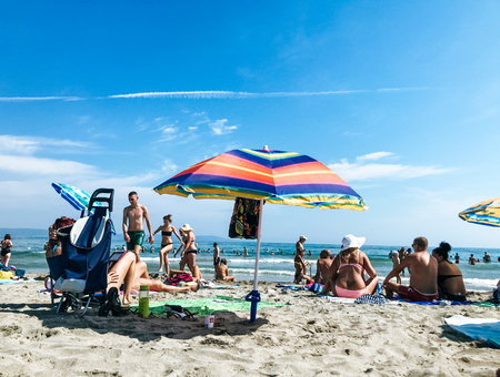 Pomorie, Bulgaria - September 03, 2019: People Relaxing On The Beach.のeditorial素材