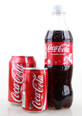 AYTOS, BULGARIA - JANUARY 28, 2014: Coca-Cola isolated on white background. Coca-Cola is a carbonated soft drink sold in stores, restaurants, and vending machines throughout the world.のeditorial素材