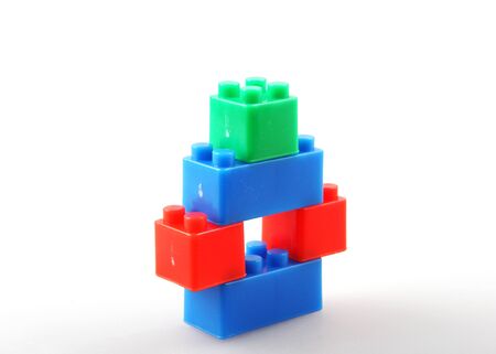 Plastic building blocks toys isolated on white background