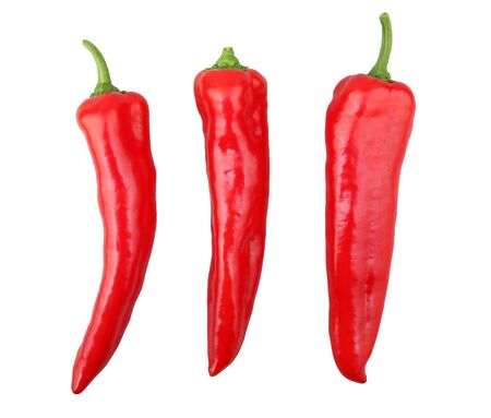 Close-Up Of Red Chili Pepper Against White Background
