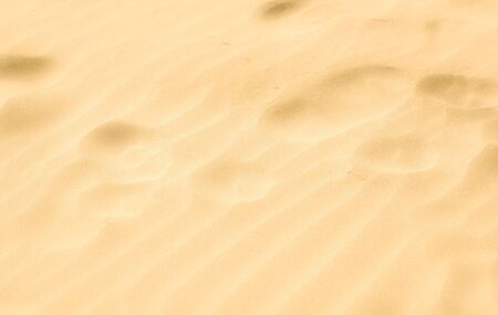 Close-Up Of Sand Background Texture.