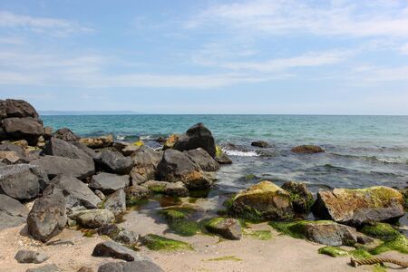 Beach and sea in bright sunlight