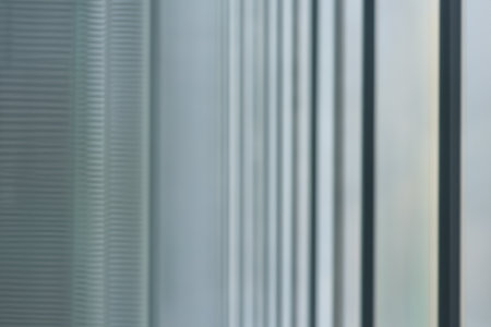 blurred abstract grey glass wall from building background. abstract architectural themeの写真素材