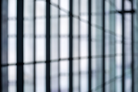 blurred abstract grey glass wall from building background. abstract architectural themeの写真素材