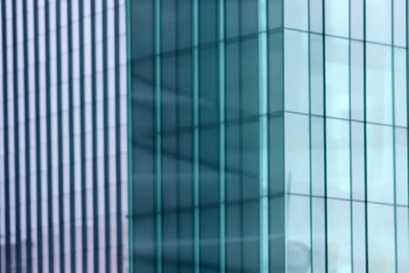 blurred abstract grey glass wall from building background. abstract architectural themeの写真素材