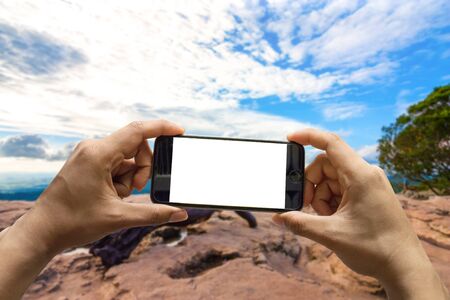 Use mobile smartphone. Shot with one-person view, blank screen on sky.