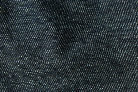 Black jeans fabrics background, The Close up black jeans texture.の写真素材