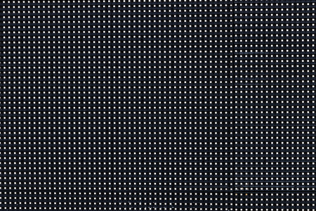 Perforated plastic texture seamless pattern background.の写真素材