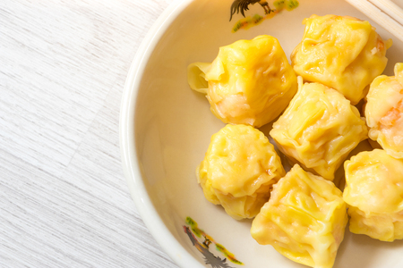 Close up  Siu Mai / Dim sum - Chinese steamed shrimp dumplings.の写真素材