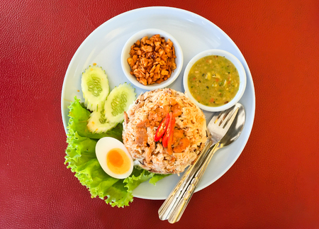Top view Crab Fried Rice - Fried rice thai style Asia Thailand on red background.の写真素材
