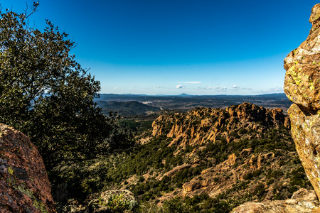 panoramic view on trail to red rocks of roquebrune sur argens, franceの写真素材