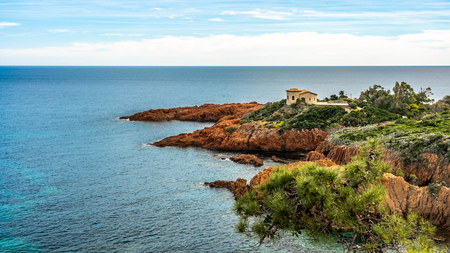 red rocks coast and sea at the French Riviera in Cote d Azur near Cannes, Provence, Franceの写真素材