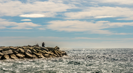 man taking pictures at french riviera in saint raphael, franceの写真素材