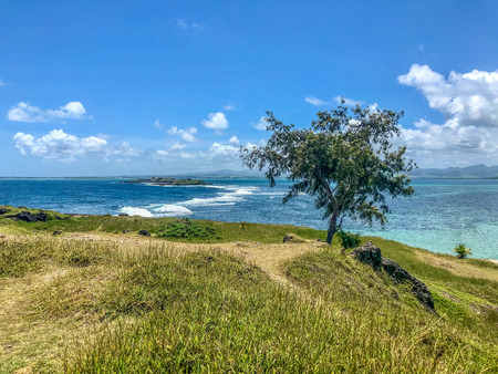 view on blue bay lagoon from small island, mauritiusの写真素材