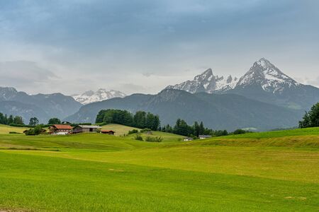 view of bavarian alps landscape with Watzmann peak in the background, National Park Berchtesgadener Land, Bavaria, Germanyの写真素材