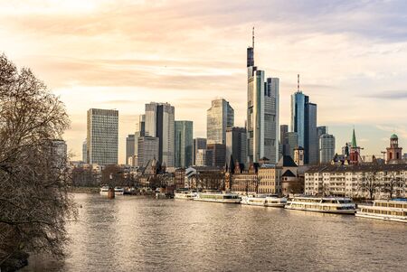 frankfurt skyline at sunset with reflections in the main river, frankfurt am main, germanyの写真素材