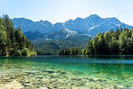 View on the beautiful zugspitze mountain and the eibsee in bavaria, germanyの写真素材