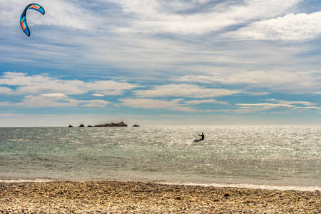 kite surfer in action on french riviera in saint raphael, franceの写真素材