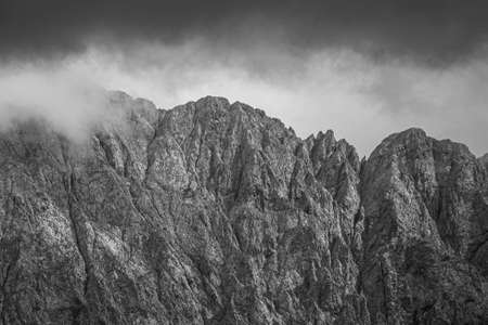 mountain panorama of the karwendel mountains with clouds in bavaria, germanyの写真素材