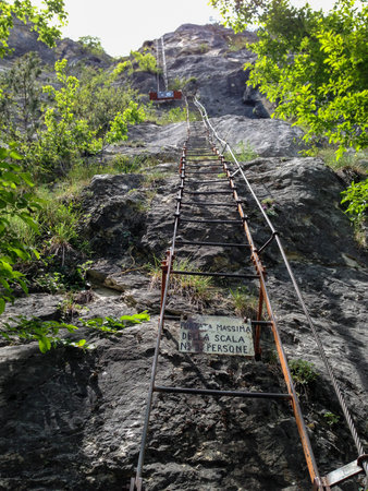 climbing the via ferrata of cima d'oro at the garda lake, city of Arco, northern italyの写真素材