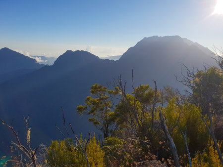 cirque de cilaos at sunrise viewed from a trail to le maido mountain topの写真素材