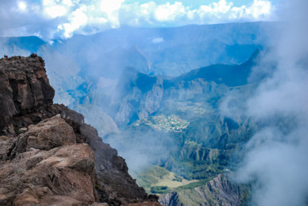 cirque de cilaos at sunrise viewed from a trail to le maido mountain topの写真素材