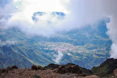 cirque de cilaos at sunrise viewed from a trail to le maido mountain topの写真素材