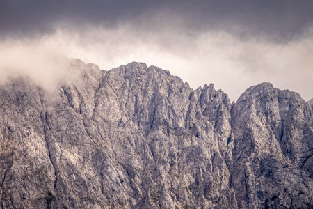 mountain panorama of the karwendel mountains with clouds in bavaria, germanyの写真素材
