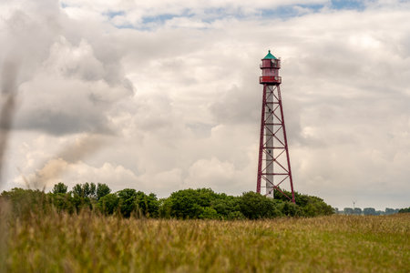 view on the lighthouse of camping near emden, north sea, germanyの写真素材