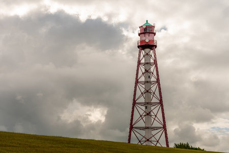 view on the lighthouse of camping near emden, north sea, germanyの写真素材