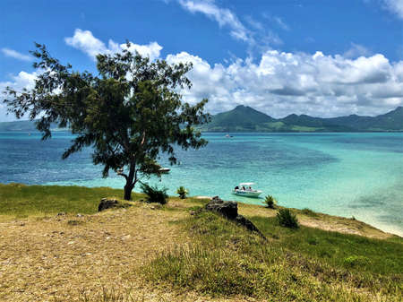 view on blue bay lagoon from small island, mauritiusの写真素材