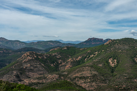 cap roux hiking trail In the red rocks of the Esterel mountains with the blue sea of the Mediterraneanの写真素材