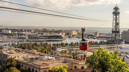 historic cable car, towers, harbor and city panorama of Barcelona, spainの写真素材