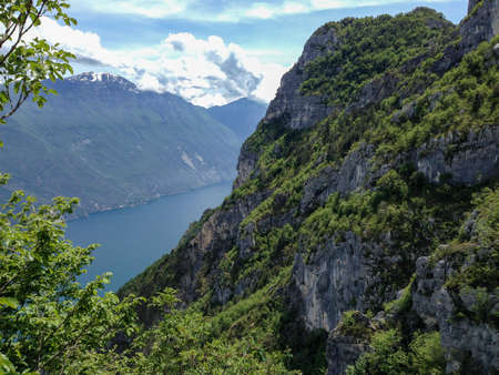 panoramic view on Riva del garda from mountain peak of cima d'oro and the lake of garda in northern italyの写真素材
