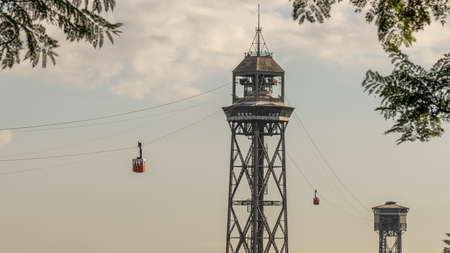 historic cable car, towers, harbor and city panorama of Barcelona, spain