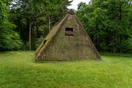 Characteristic stable for German moorland sheep with a straw roof in the natural preserve Lueneburger Heide, Germanyの写真素材