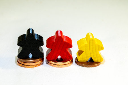 Coins stacks with figures in yellow red black, German success, finance, marketの写真素材