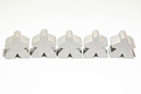 abstract illustration of people, three wooden figures on white backgroundの写真素材