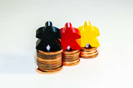 illustration of financial success concept with figurines on euro centsの写真素材