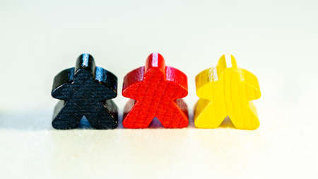 German country and people represented by black, red, yellow figurines made from woodの写真素材