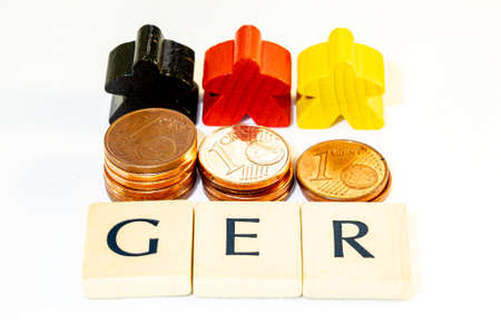 illustration of germany with wood figurines and lettersの写真素材