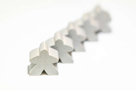 abstract illustration of people, three wooden figures on white backgroundの写真素材