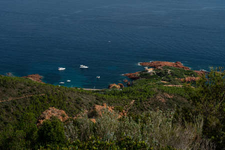 cap roux hiking trail In the red rocks of the Esterel mountains with the blue sea of the Mediterraneanの写真素材