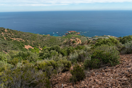 cap roux hiking trail In the red rocks of the Esterel mountains with the blue sea of the Mediterraneanの写真素材