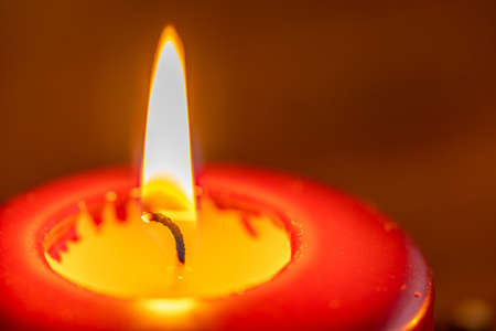 Close up of an advent wreath with pine cones, dried orange slices and candlesの写真素材