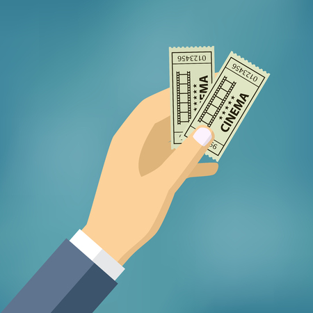 Hand holding or showing two cinema tickets.のイラスト素材