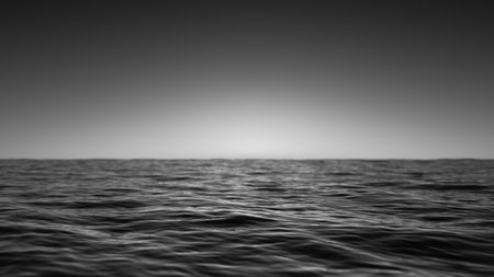 3d render. Black and white monochrome seascape with a distant horizon. The sun's rays faintly illuminate a dark, textured ocean, creating a moody monochrome landscape that evokes mystery and depthの写真素材